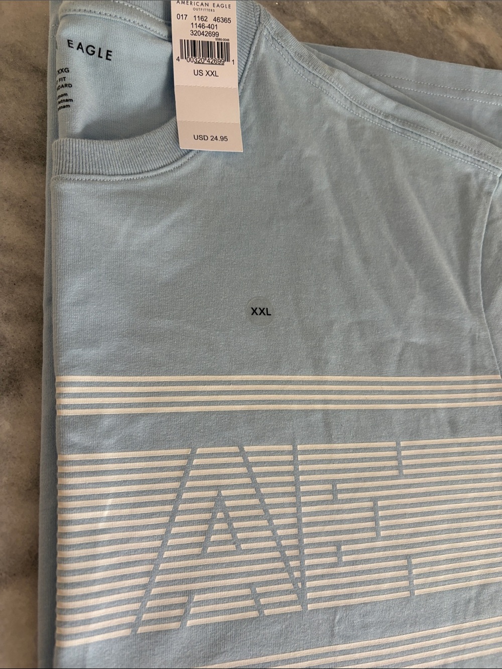 American Eagle Outfitters Light Blue Short‑Sleeve Tee with White Stripe Graphic